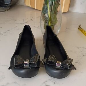 Melissa Black Flats with Metallic Bow
